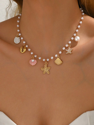 Gold starfish shell faux - &,